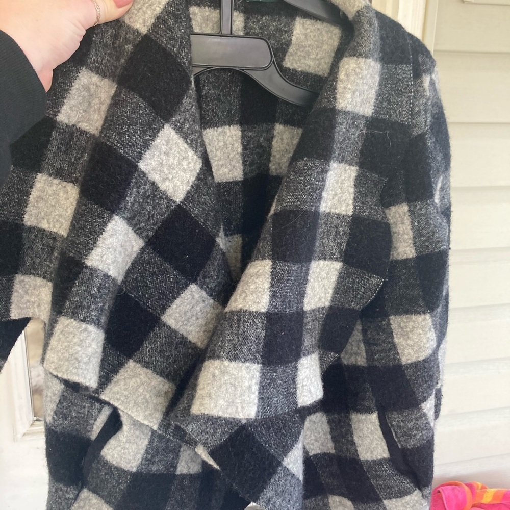 ‘Lauren’ checkered sweater.
